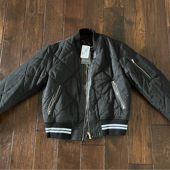 Women’s black & white number jacket fate new fits like a small or extra small - Picture 1 of 5